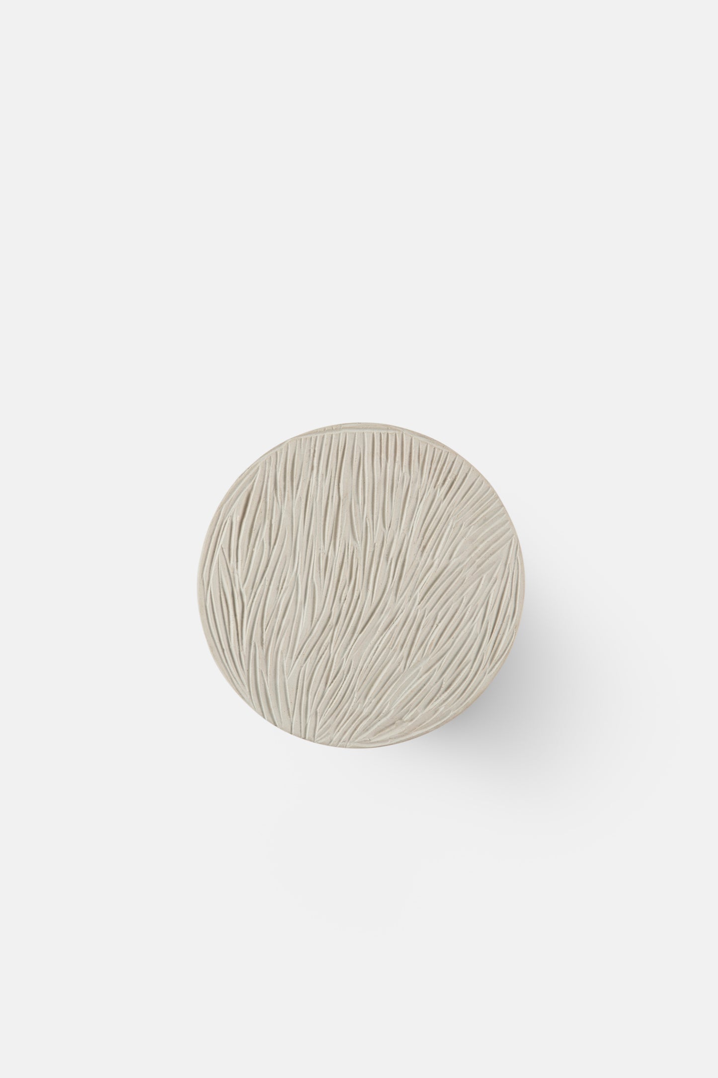 Clay disc wall light