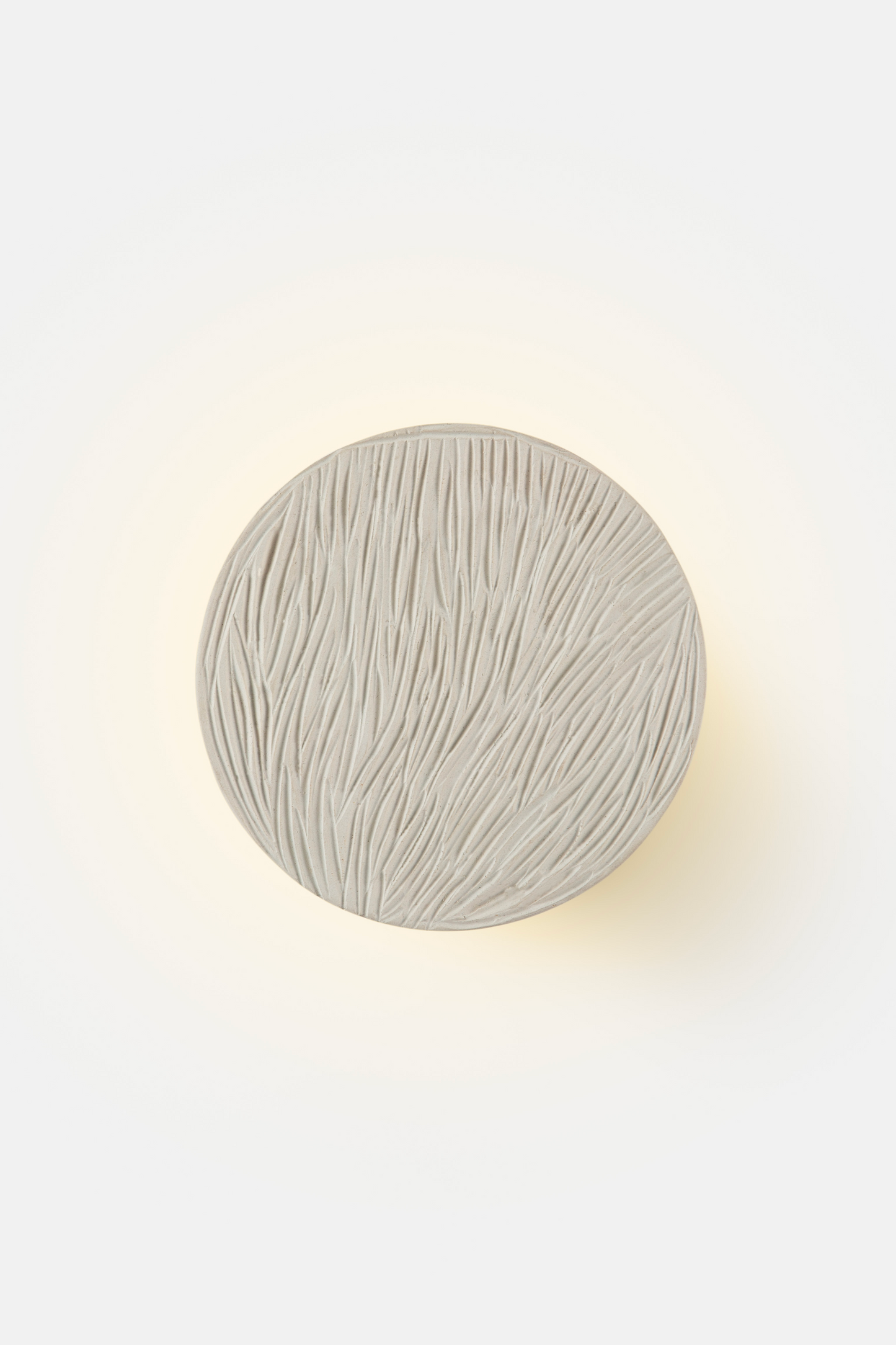 Clay disc wall light
