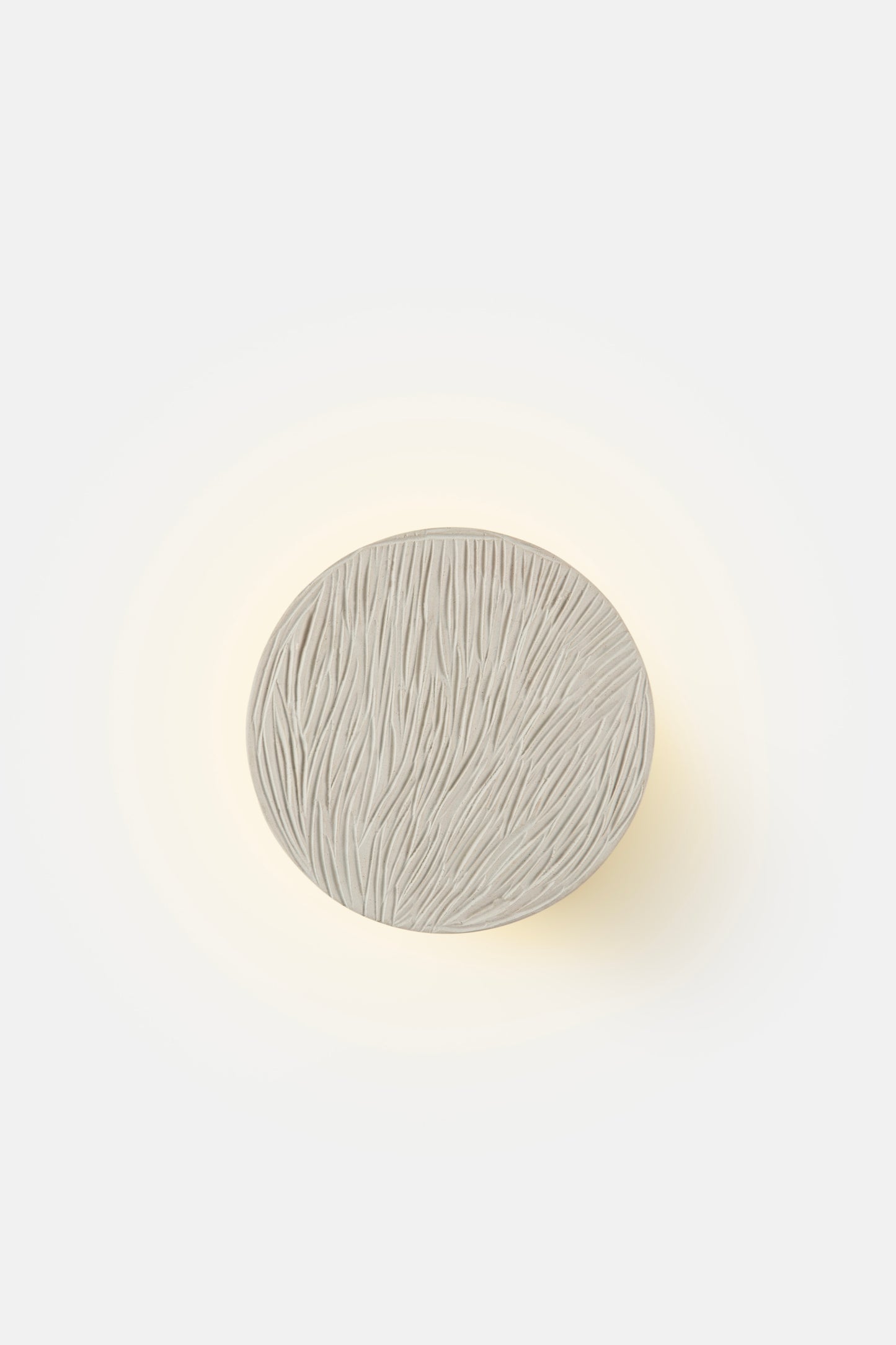 Clay disc wall light